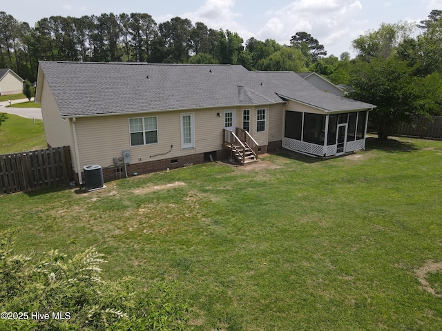 2801 Fletcher Ct, Castle Hayne, NC 28429 - rear view of house featuring fence, roof with shingles, a sunroom, crawl space, and a lawn
