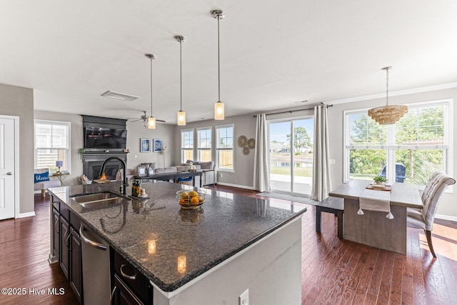 7408 Darius Dr, Wilmington, NC 28411 - kitchen with a sink, open floor plan, dark wood-type flooring, and baseboards