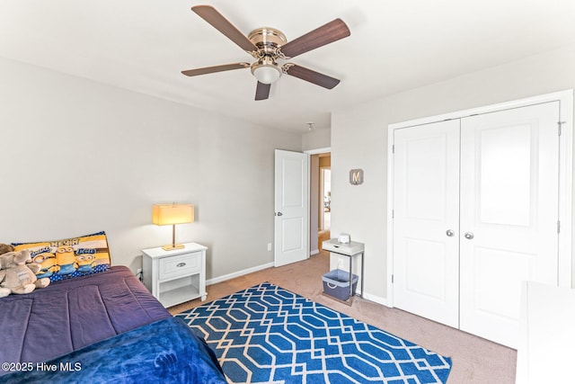 7408 Darius Dr, Wilmington, NC 28411 - bedroom with carpet floors, baseboards, a closet, and a ceiling fan