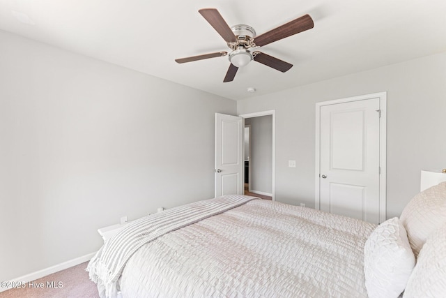 7408 Darius Dr, Wilmington, NC 28411 - carpeted bedroom featuring baseboards and ceiling fan
