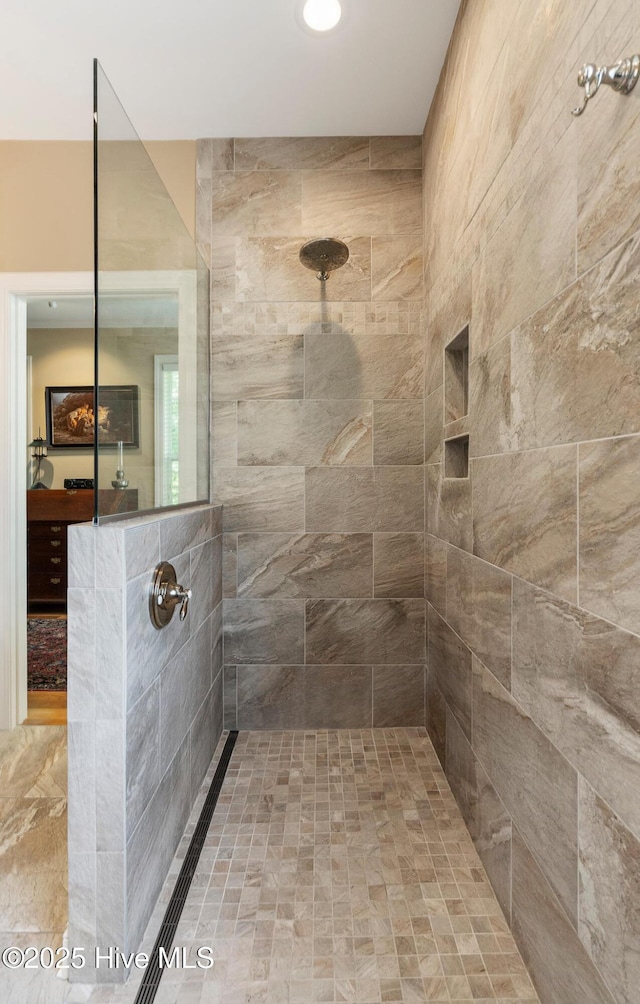 3603 Seafoam Ct, New Bern, NC 28562 - bathroom featuring tiled shower and recessed lighting