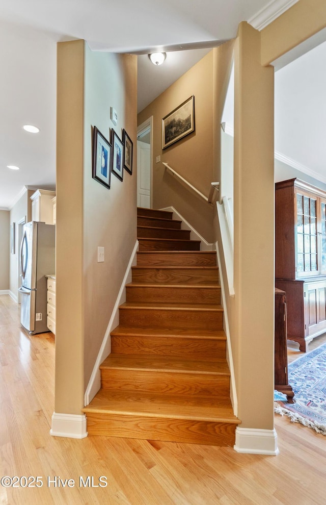 3603 Seafoam Ct, New Bern, NC 28562 - stairs featuring wood finished floors, baseboards, and recessed lighting