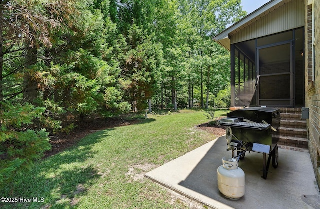 3603 Seafoam Ct, New Bern, NC 28562 - view of green lawn featuring a patio, a sunroom, and entry steps