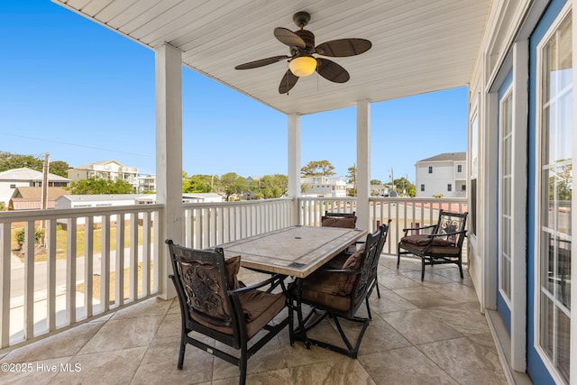 1505 Mackerel Ln Unit 1, Carolina Beach, NC 28428 - balcony with a residential view, outdoor dining space, and ceiling fan