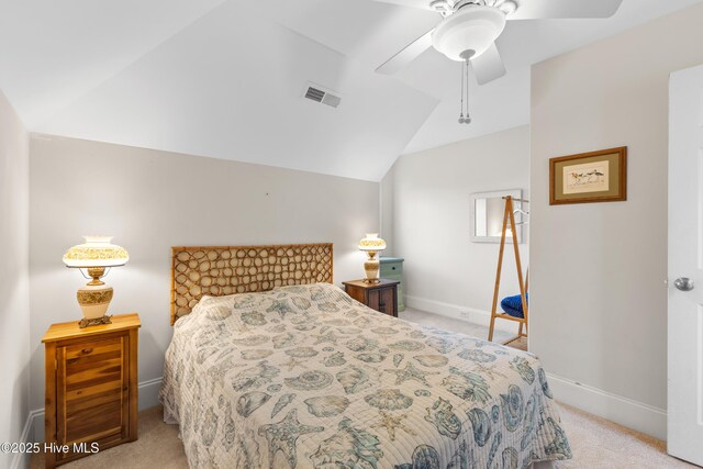1505 Mackerel Ln Unit 1, Carolina Beach, NC 28428 - bedroom with light carpet, lofted ceiling, baseboards, and ceiling fan