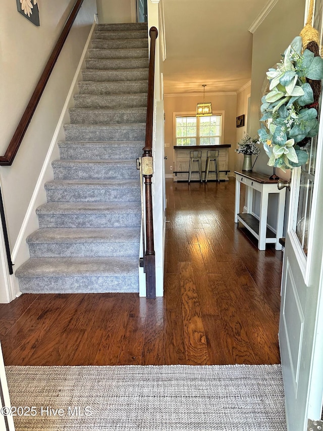 204 Liana Pl, Hubert, NC 28539 - stairs with hardwood / wood-style floors, crown molding, and baseboard heating