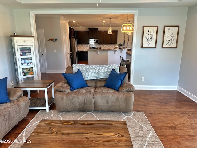 204 Liana Pl, Hubert, NC 28539 - living room with baseboards, dark wood-style flooring, and recessed lighting