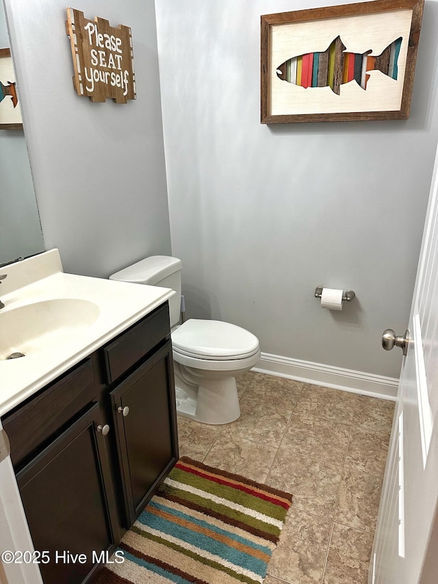 204 Liana Pl, Hubert, NC 28539 - bathroom featuring toilet, vanity, and baseboards