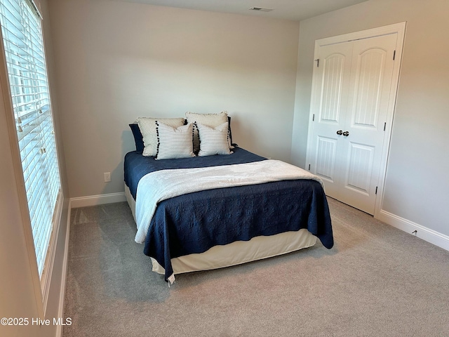 204 Liana Pl, Hubert, NC 28539 - bedroom with carpet floors, baseboards, and a closet