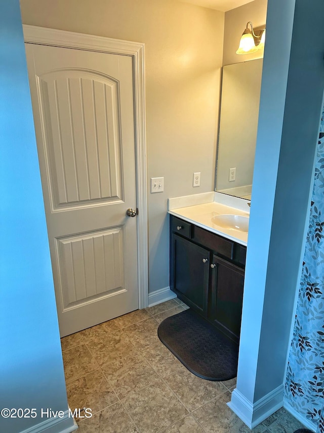 204 Liana Pl, Hubert, NC 28539 - bathroom featuring vanity and baseboards