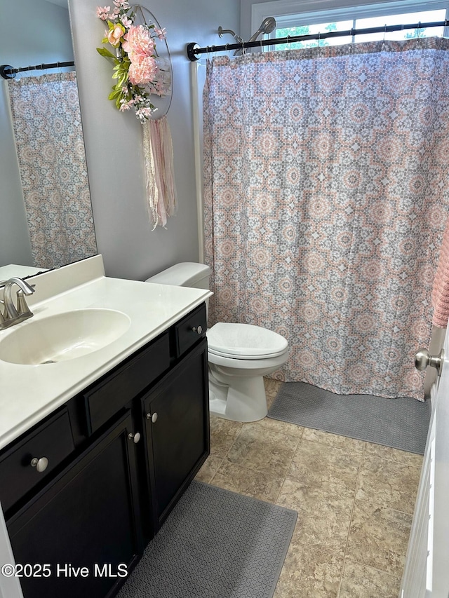 204 Liana Pl, Hubert, NC 28539 - full bathroom with vanity, toilet, and a shower with shower curtain