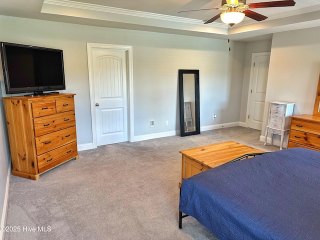 204 Liana Pl, Hubert, NC 28539 - bedroom featuring crown molding, a tray ceiling, light carpet, baseboards, and ceiling fan