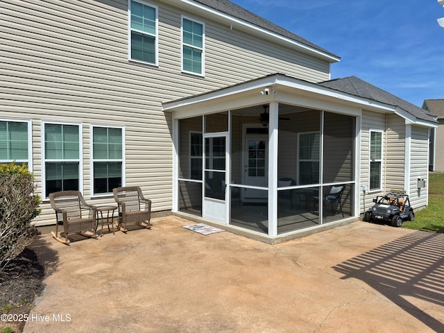 204 Liana Pl, Hubert, NC 28539 - rear view of property featuring a sunroom, a patio area, and roof with shingles