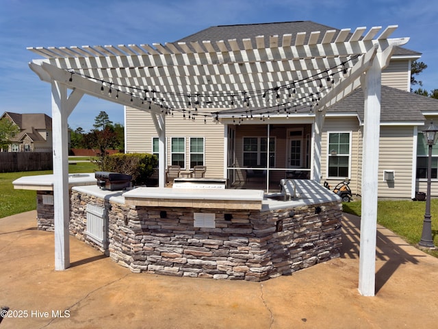 204 Liana Pl, Hubert, NC 28539 - view of patio / terrace featuring exterior kitchen and a pergola