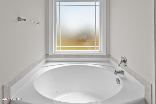 bathroom featuring a bath