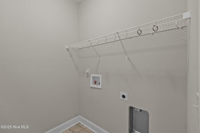 laundry area with baseboards, washer hookup, electric dryer hookup, and laundry area