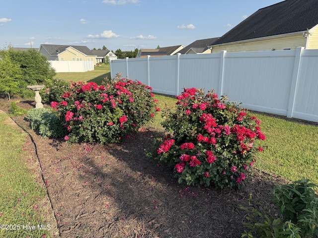 view of yard with fence