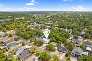124 NE 15th St, Oak Island, NC 28465 - drone / aerial view featuring a residential view