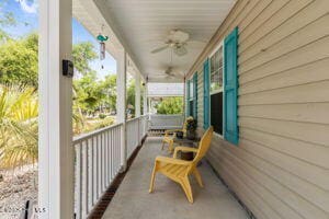 124 NE 15th St, Oak Island, NC 28465 - exterior space with a porch and ceiling fan