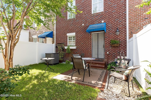 7610 High Market St Unit 3, Sunset Beach, NC 28468 - view of patio with central AC unit and fence
