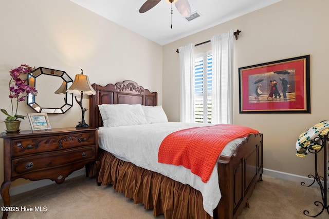 7610 High Market St Unit 3, Sunset Beach, NC 28468 - bedroom with light carpet, a ceiling fan, and baseboards