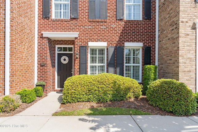 7610 High Market St Unit 3, Sunset Beach, NC 28468 - property entrance featuring brick siding