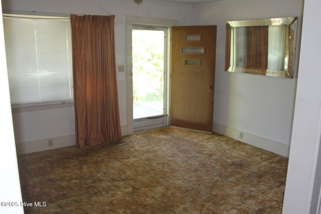 empty room with carpet flooring