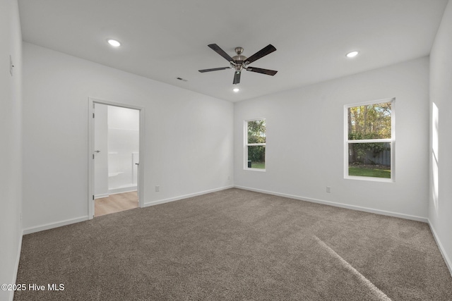 spare room with a ceiling fan, baseboards, recessed lighting, and carpet floors