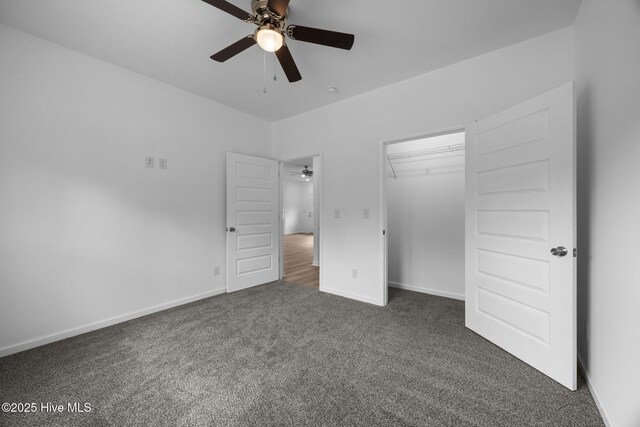 2594 Fountaintown Rd, Chinquapin, NC 28521 - unfurnished bedroom featuring carpet floors, recessed lighting, a walk in closet, and ceiling fan