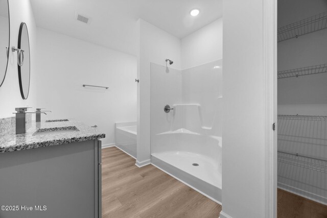 2594 Fountaintown Rd, Chinquapin, NC 28521 - bathroom featuring vanity and wood finished floors