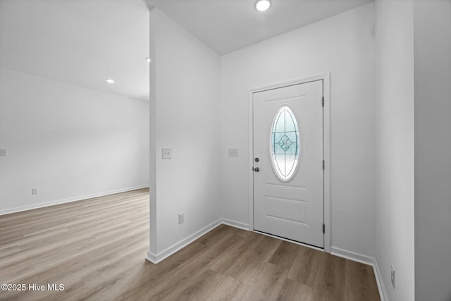 2594 Fountaintown Rd, Chinquapin, NC 28521 - unfurnished living room with recessed lighting, a ceiling fan, a large fireplace, and light wood-type flooring