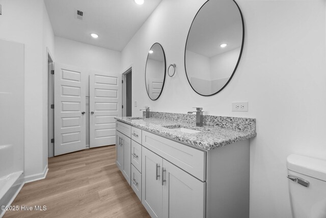 2594 Fountaintown Rd, Chinquapin, NC 28521 - bathroom with wood finished floors and bathtub / shower combination