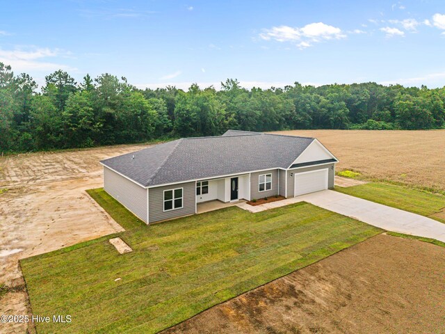2594 Fountaintown Rd, Chinquapin, NC 28521 - view of front of house with board and batten siding and roof with shingles
