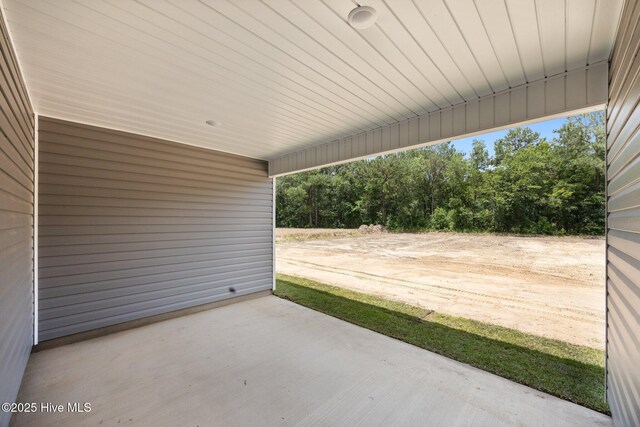 2594 Fountaintown Rd, Chinquapin, NC 28521 - view of exterior entry with covered porch