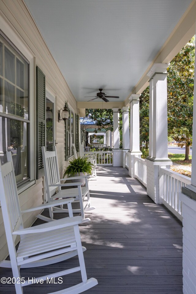 505 N Broad St, Edenton, NC 27932 - wooden porch with a ceiling fan