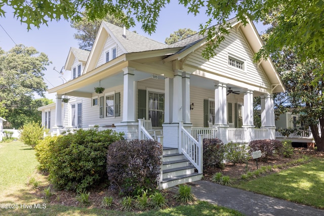 505 N Broad St, Edenton, NC 27932 - view of front of home featuring a porch, a shingled roof, ceiling fan, and a front yard