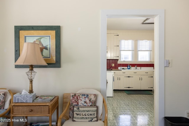 505 N Broad St, Edenton, NC 27932 - hallway featuring tile patterned floors and a sink