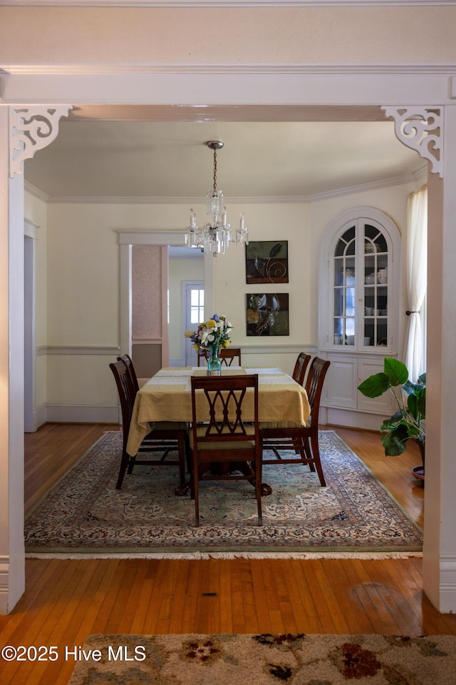 505 N Broad St, Edenton, NC 27932 - dining space with hardwood / wood-style flooring, ornamental molding, and a chandelier