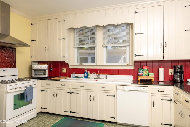 505 N Broad St, Edenton, NC 27932 - kitchen with white appliances, wall chimney exhaust hood, crown molding, a sink, and tile patterned floors