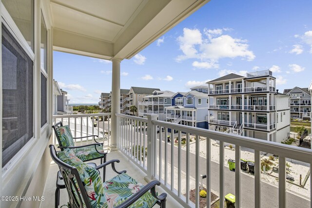 balcony featuring a residential view