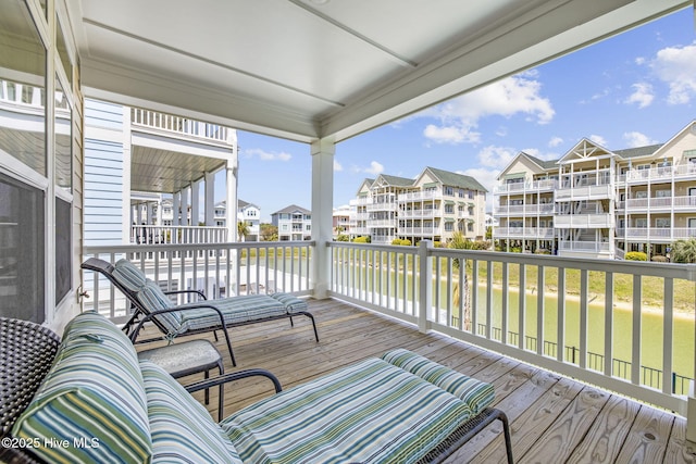 deck featuring a water view