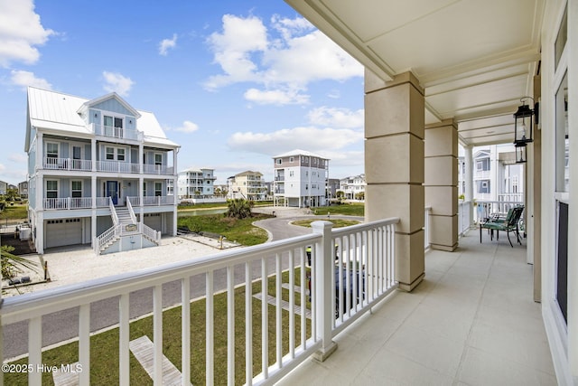 balcony featuring a residential view