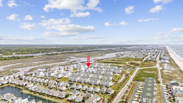 aerial view with a residential view and a water view