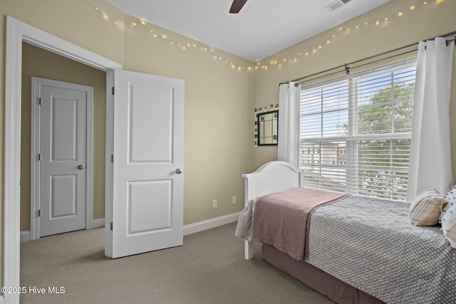 bedroom featuring carpet, visible vents, ceiling fan, and baseboards