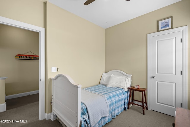 bedroom with baseboards, a ceiling fan, and carpet floors