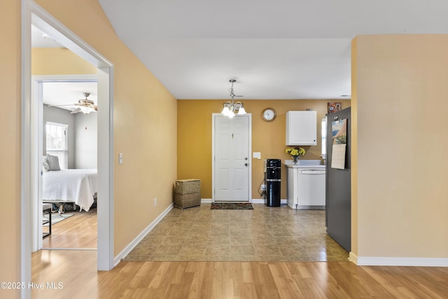 8602 Heirloom Dr NE, Leland, NC 28451 - entrance foyer featuring baseboards and light wood-style floors