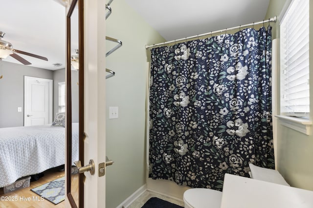 8602 Heirloom Dr NE, Leland, NC 28451 - full bath with ceiling fan, a healthy amount of sunlight, and connected bathroom