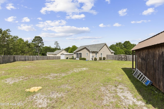 8602 Heirloom Dr NE, Leland, NC 28451 - view of yard featuring a fenced backyard