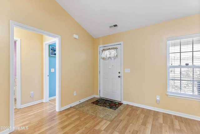 8602 Heirloom Dr NE, Leland, NC 28451 - entrance foyer with visible vents, light wood finished floors, and plenty of natural light