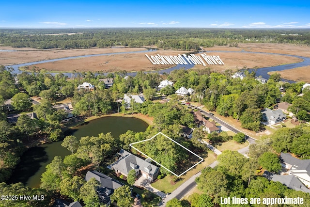 79 Plantation Passage Dr SE, Bolivia, NC 28422 - birds eye view of property featuring a water view